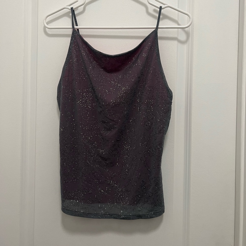 A grey tank top from Hot Spot. The size says L but I would say it’s a M
